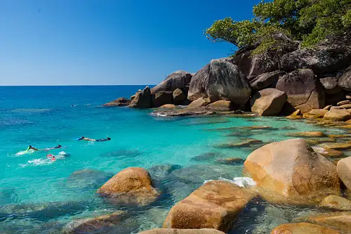 Moore Reef & Fitzroy Island | Fly Out & Cruise Back