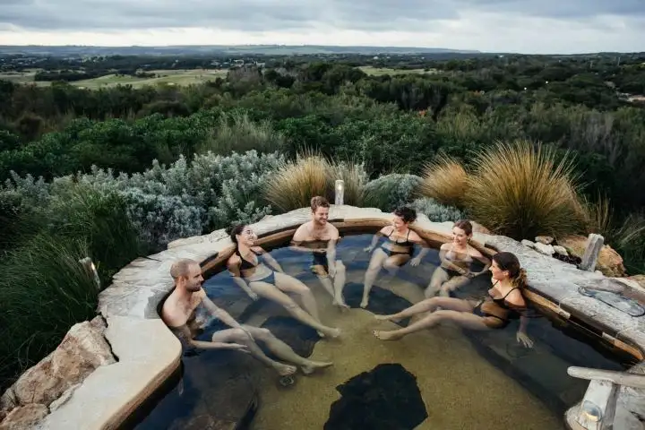 Bath House - Group relaxing in Hilltop pool.jpg
